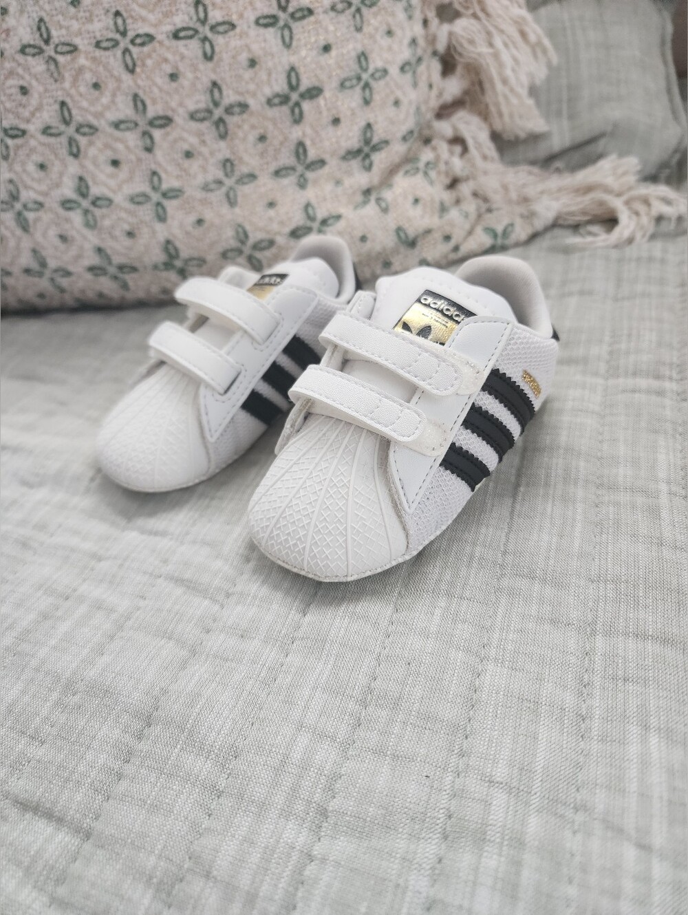 adidas Kids White Sneakers with Black Stripes and Gold Accents